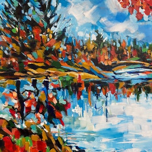 May include: A painting of a lake scene with fall foliage in shades of red, orange, yellow, and green. The trees are reflected in the water, which is a bright blue. The sky is a light blue with white clouds.