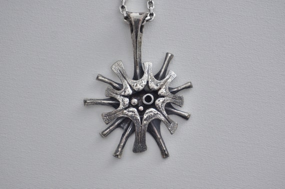 Guy Vidal necklace Supernova, brutalist silver & p