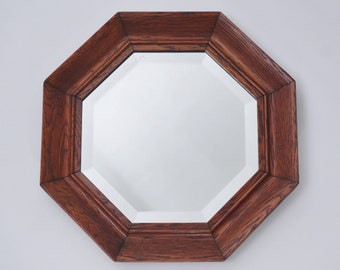 Antyczne lustro ścienne w stylu art déco, ośmiokątna rama z litego drewna dębowego z falistymi krawędziami, fazowane, lata 30. XX wieku, angielskie
