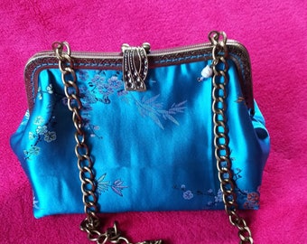 Blue floral clutch with retro clasp