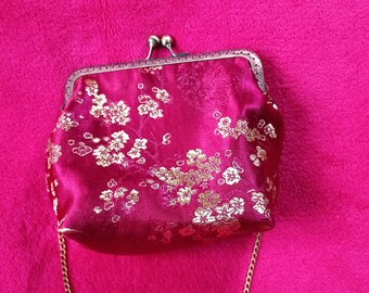 Burgundy and gold floral clutch with retro clasp