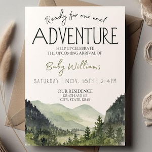 May include: A baby shower invitation with the text "Ready for our next ADVENTURE" in black script. The invitation includes the name "Baby Williams" in green script, and event details. A watercolor mountain scene is at the bottom.