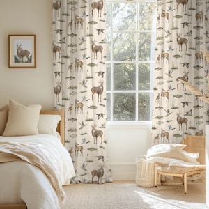May include: Off-white curtains featuring a repeating pattern of brown deer, various fish, and flying ducks in natural tones. The fabric displays detailed illustrations of wildlife in a woodland setting, hanging floor-to-ceiling over a window.