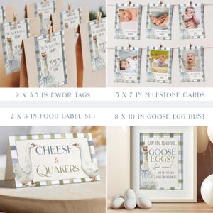 Op de afbeelding: Een verzameling baby shower decoraties met een ganzen thema. Inclusief bedanklabels, mijlpaalkaarten, voedsel labels en een ingelijste poster. De kleuren zijn zacht blauw, wit en bruin.
