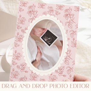 May include: A pink card with a floral rose pattern and an oval frame. The frame contains an ultrasound image. The card has the text "DRAG AND DROP PHOTO EDITOR" at the bottom. The overall theme is pregnancy and baby announcements.