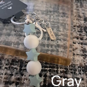 Ad Astra Clip-on Keychain