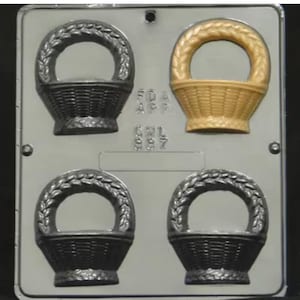 May include: A plastic mold for making chocolate baskets. The mold has four cavities, each shaped like a basket with a woven design. Two of the cavities are filled with gold-colored chocolate, while the other two are empty.