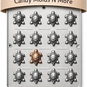 May include: A rectangular metal candy mold tray featuring sixteen turtle-shaped cavities arranged in a four-by-four grid. Fifteen cavities are silver-colored, while one cavity in the third row is copper-colored. The text Candy Molds N More is printed at the top.