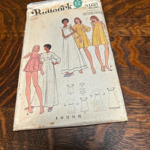 May include: A vintage Butterick sewing pattern envelope, number 3160, size 10. The white paper envelope features illustrations of various dress and sleepwear styles in yellow and floral prints, along with technical line drawings and size labels.