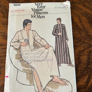 May include: A vintage sewing pattern titled "Very Easy Vogue Patterns for Men." The pattern features illustrations of a man in a robe. The pattern is size medium and includes the price of $2.50.