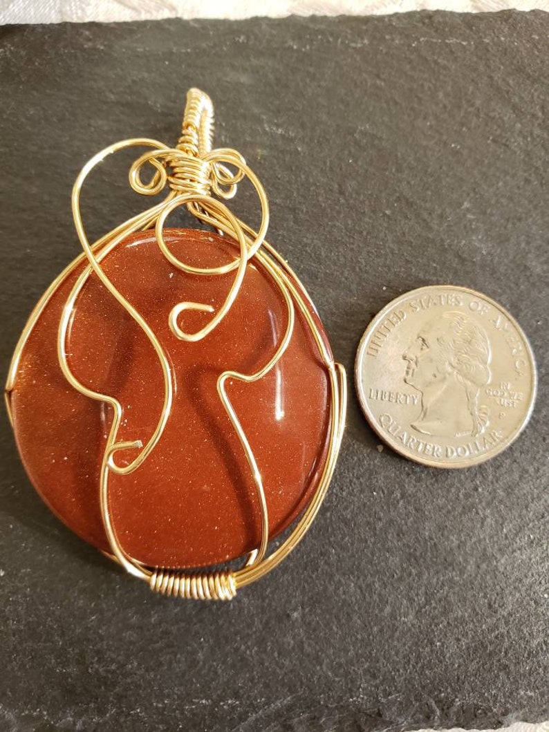 Goldstone Wire Wrapped Pendant
