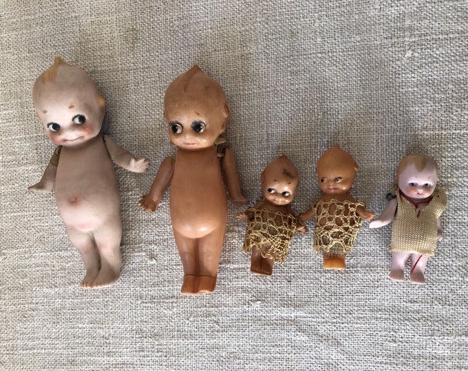 Collection of Antique Kewpie Dolls, Two Bisque, Three Celluloid