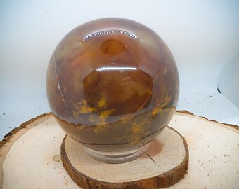 Carnelian Carved Ball Statue With Plastic Ring Ball Holder (VARIANT 01)