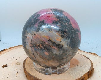Rhodonite Carved Ball Statue With Plastic Ring Ball Holder
