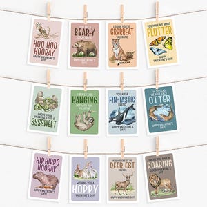 May include: A set of Valentine's Day cards featuring animal illustrations, such as an owl, bear, tiger, butterflies, snake, sloth, orca, otters, hippo, rabbits, deer, and lion. The cards are attached to a string with wooden pegs.