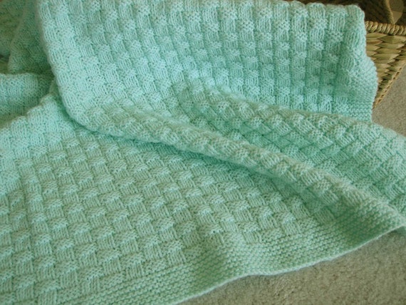 Pastel green hand knit baby blanket
