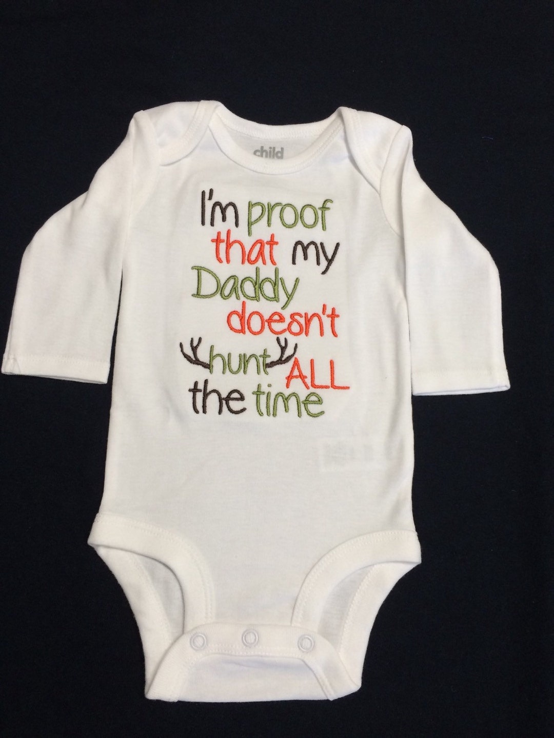 Body Bebê AW Fashions - Frase Engraçada 'I Am Proof My Daddy Does Not Shoot Blanks'