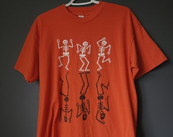 VINTAGE Late 80s Early 90s Hallmark Single Stitch Skeleton Halloween Party Orange Tee