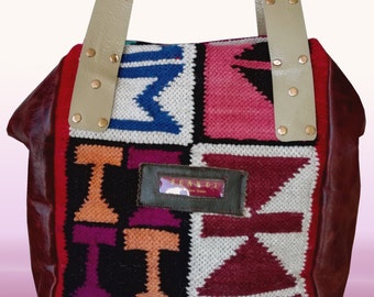 Handtasche Terra Inca. Gemuster, Leder Bordeaux.