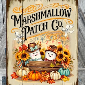 May include: Wooden sign with the text "Marshmallow Patch Co." featuring a whimsical design. Two marshmallow characters in hats sit in a wooden crate surrounded by sunflowers, pumpkins, and autumn leaves. The sign has a rustic, vintage aesthetic.