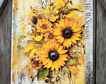 May include: A vintage-style art print featuring a bouquet of sunflowers and other yellow flowers with a distressed background and the text "You Are My Sunshine".