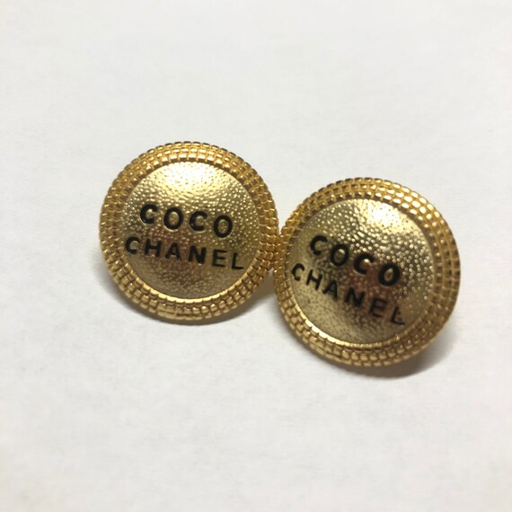 CHANEL earrings | Black gold CC Chanel pierced ear