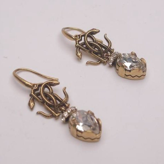 Roberto Cavalli earrings | snake logo rhinestone