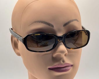 Ralph Lauren RA5188 1343/4N Black Tortoise Oval Sunglasses  display picture 1