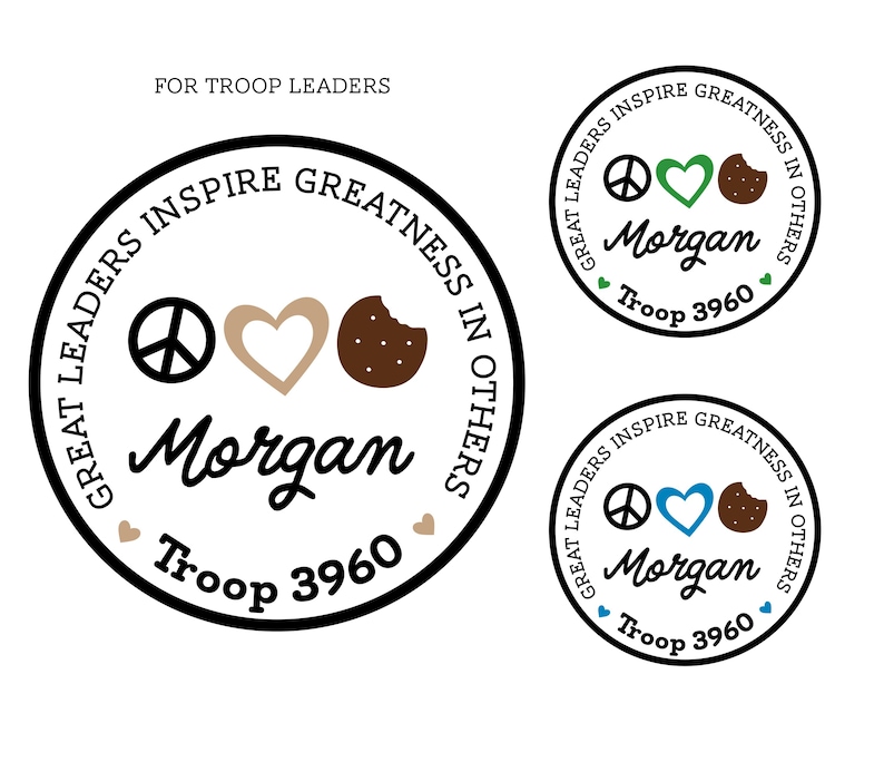 May include: Circular design with the text "GREAT LEADERS INSPIRE GREATNESS IN OTHERS." The design includes a peace symbol, a heart, and a cookie. The name "Morgan" and "Troop 3960" are also included.