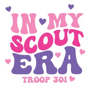 May include: A pink, purple, and white graphic design with the text "In My Scout Era" and "Troop 301" with hearts.