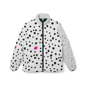May include: White puffer jacket with a black polka dot design. The jacket features a black zip and trim, with a pink accent on the sleeve and body. The collar is also dotted.