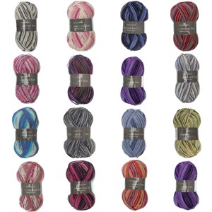 May include: Assortment of 16 colourful striped yarn skeins, each with a white label that reads "Woolcraft Superwash Sock Yarn".