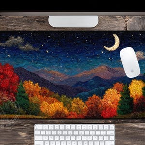 May include: A rectangular mousepad featuring a vibrant landscape painting. The artwork depicts a night scene with a crescent moon, stars, and colorful autumn trees. A white computer mouse rests on the pad, with a keyboard below.
