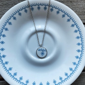 Corelle Broken Dishes Necklace - stainless steel setting stainless steel 24” chain,  from broken Corelle Snowflake Blue Garland plate