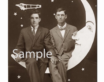 Vintage 1920’s Photo Reprint Affectionate Men Sit on Paper Moon Holding Hands Gay Interest 140