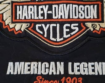 Distressed by hand done process to upcycle this one of a kind original. Womens size 1X Harley Davidson shirt