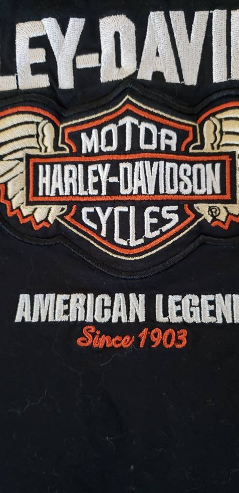 Distressed by hand done process to upcycle this one of a kind original. Womens size 1X Harley Davidson shirt