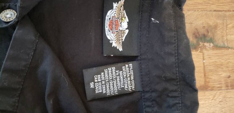 Distressed by hand done process to upcycle this one of a kind original. Womens size 1X Harley Davidson shirt