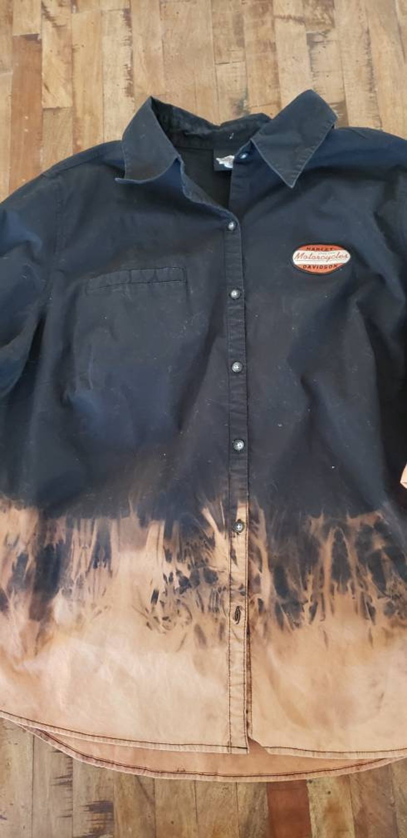 Distressed by hand done process to upcycle this one of a kind original. Womens size 1X Harley Davidson shirt