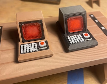 Action figure retro computer console prop