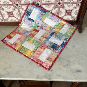 Gift of Joy Quilted Table Topper NCU0NXD267