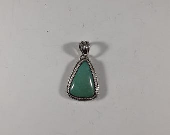 Sterling Silver Turquoise Pendant with Twist Wire Detail