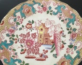 A Satsuma ware soup or tea cup with saucer