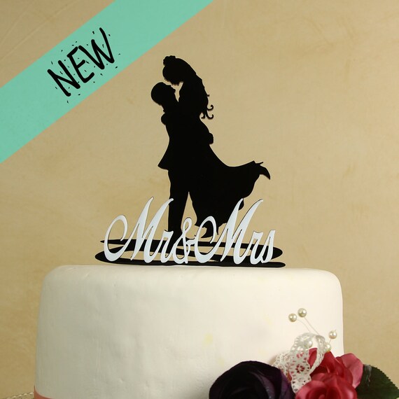 Items similar to Mr. and Mrs Wedding cake topper with