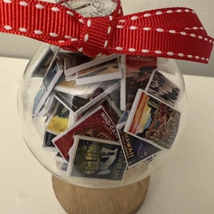 Op maat gevuld ornament: gepersonaliseerd met boeken, reizen en shows