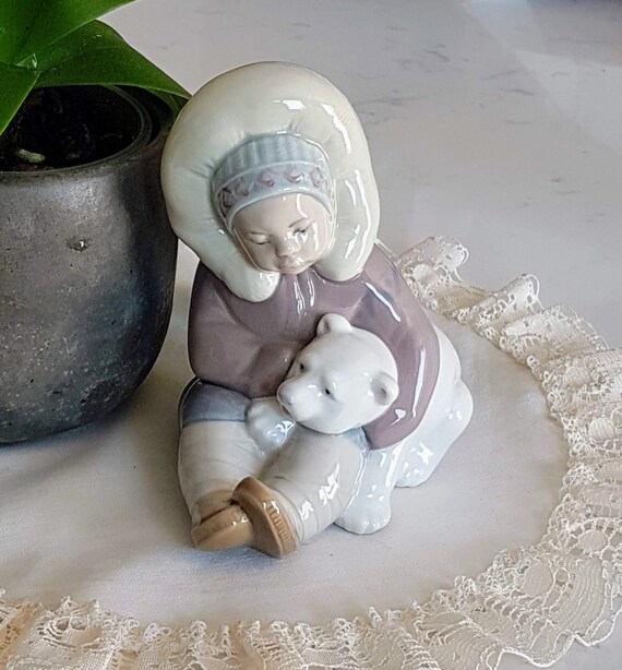 lladro eskimo boy with polar bear cub