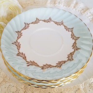 Zestaw 4 wymiennych spodków E.B. Foley Wyvern do misek na zupę/bulion, porcelana kostna, wyprodukowano w Anglii, jasnoniebieski, złote paprocie
