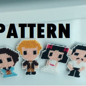 May include: Four pixel art cross-stitch patterns of characters from a popular musical. The characters are a woman with brown hair in a blue dress, a man with blonde hair in a brown jacket, a woman with black hair in a white dress, and a man with black hair in a white shirt.