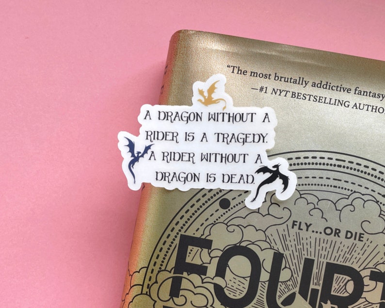 May include: A white sticker with black text and a black dragon silhouette reads "A dragon without a rider is a tragedy. A rider without a dragon is dead."