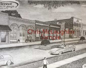 May include: A black and white pencil drawing of a small town street scene. The drawing depicts a row of brick buildings with storefronts and a vintage car driving down the street. The text "Senoia, Georgia Est. 1846 Coweta County" is visible in the upper left corner of the drawing.